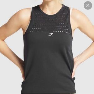 Black Gymshark tank with cutout details, seamless